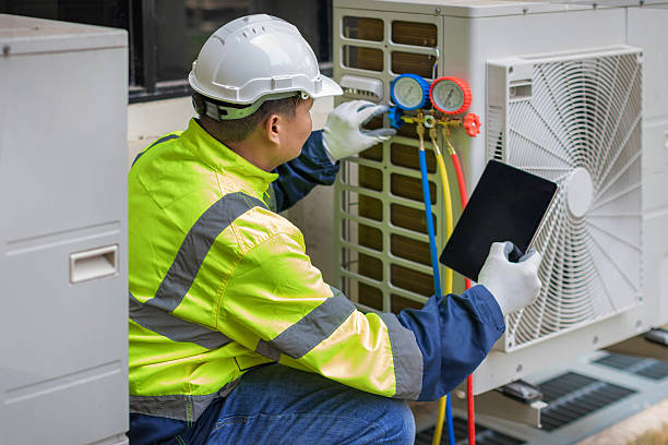 Professional Air Duct Cleaning technician working in Traver, CA